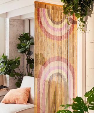 Shared bedroom ideas: Rainbow Bamboo Beaded Curtain by Urban Outfitters