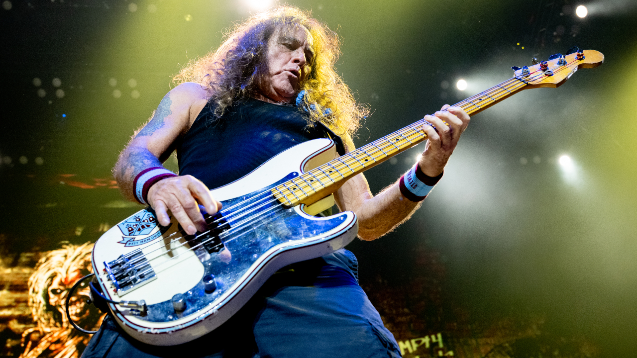 Steve Harris playing bass onstage with Iron Maiden in 2025