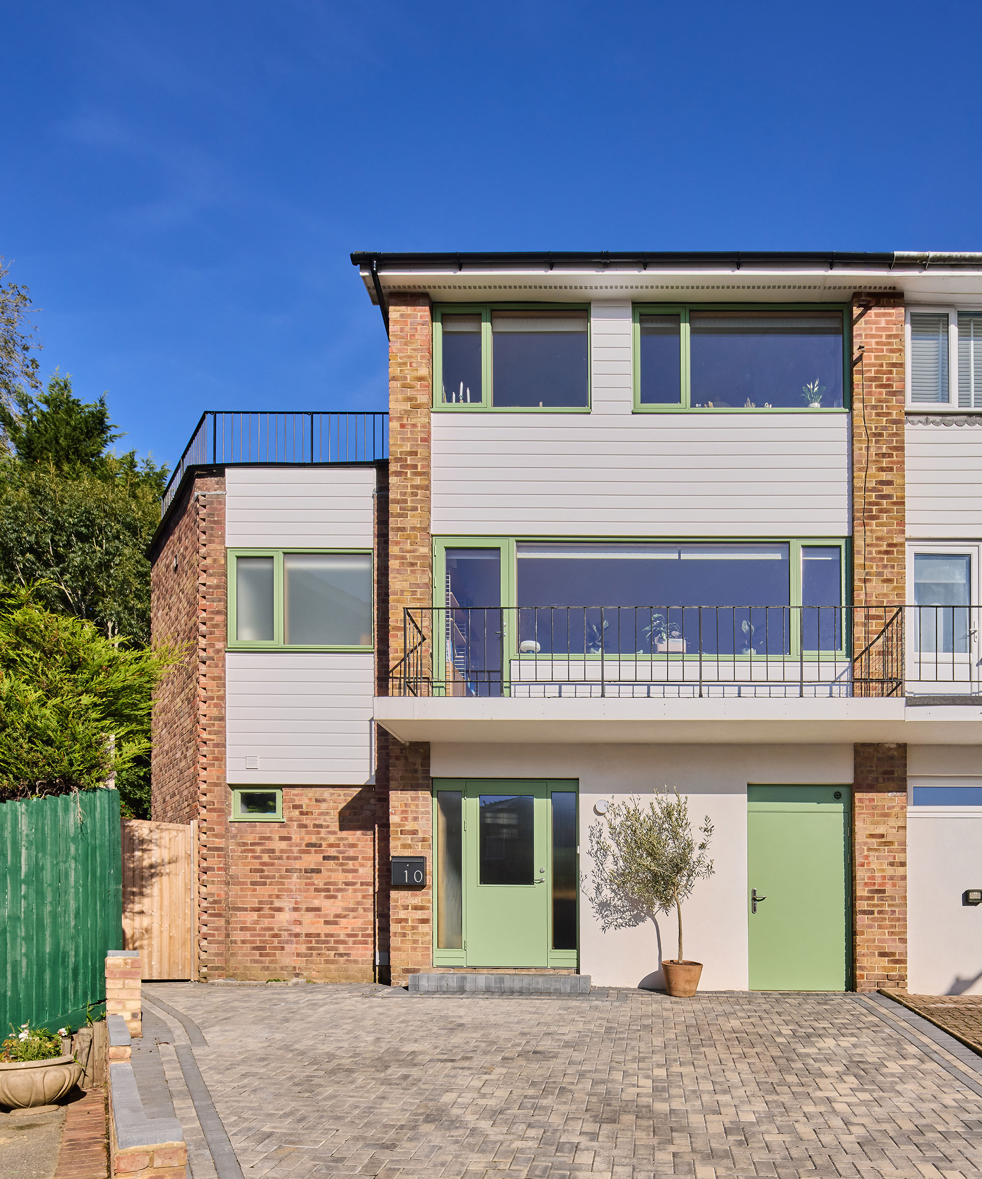 front of a renovated and extended 1970s end of terrace