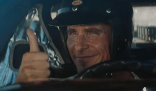 Ford v Ferrari Christian Bale giving a thumbs up from the driver's seat