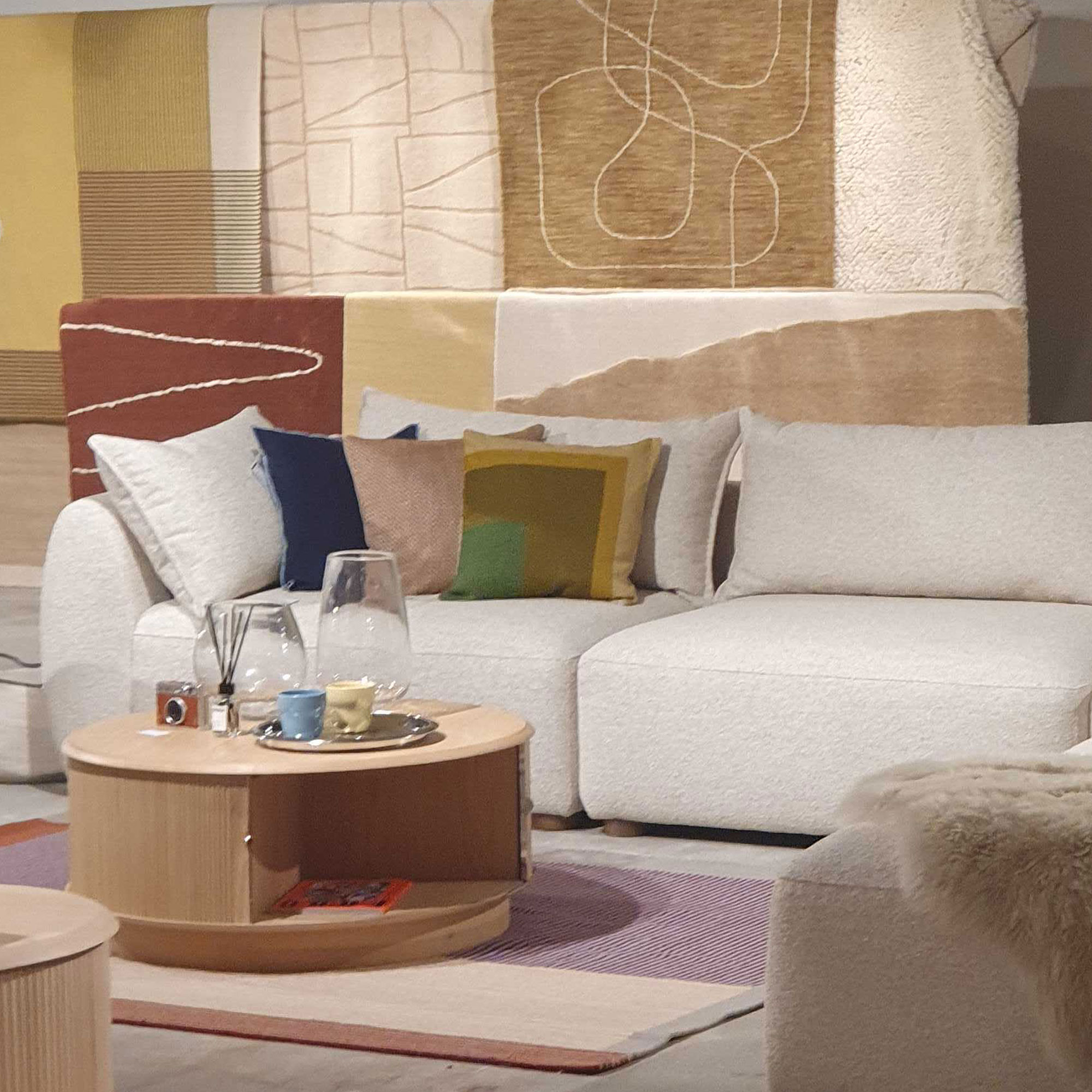 Sofa at John Lewis show in white with cushions