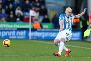 Aaron Mooy playing for Huddersfield Town against Arsenal, 2019