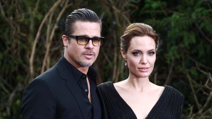 Angelina Jolie and Brad Pitt attend a private reception for costumes and props from Disney&#039;s &quot;Maleficent&quot;