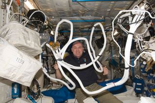 Astronaut Andre Kuipers with Equipment