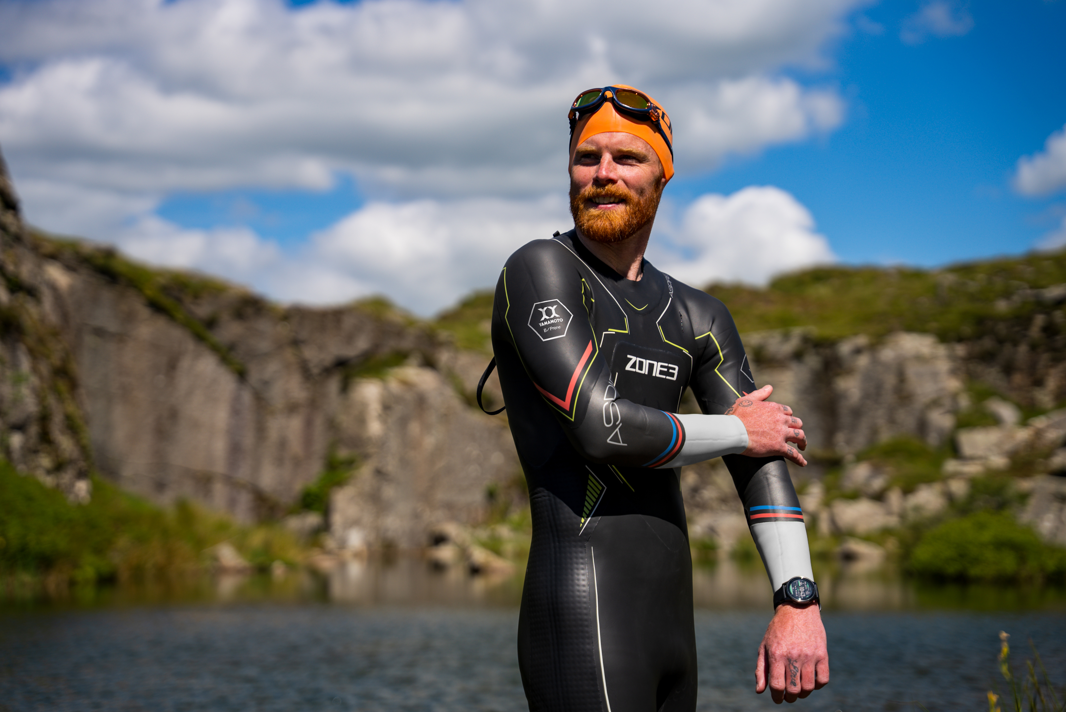 A male swimmer wearing a Zone3 Aspire wetsuit