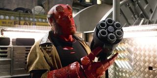 Ron Perlman's Hellboy holding gun