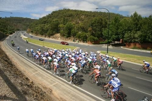The peloton heading out of town