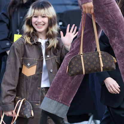 Celebrities attended the Louis Vuitton Fall 2026 show with monogram bags to celebrate the print's 130th anniversary