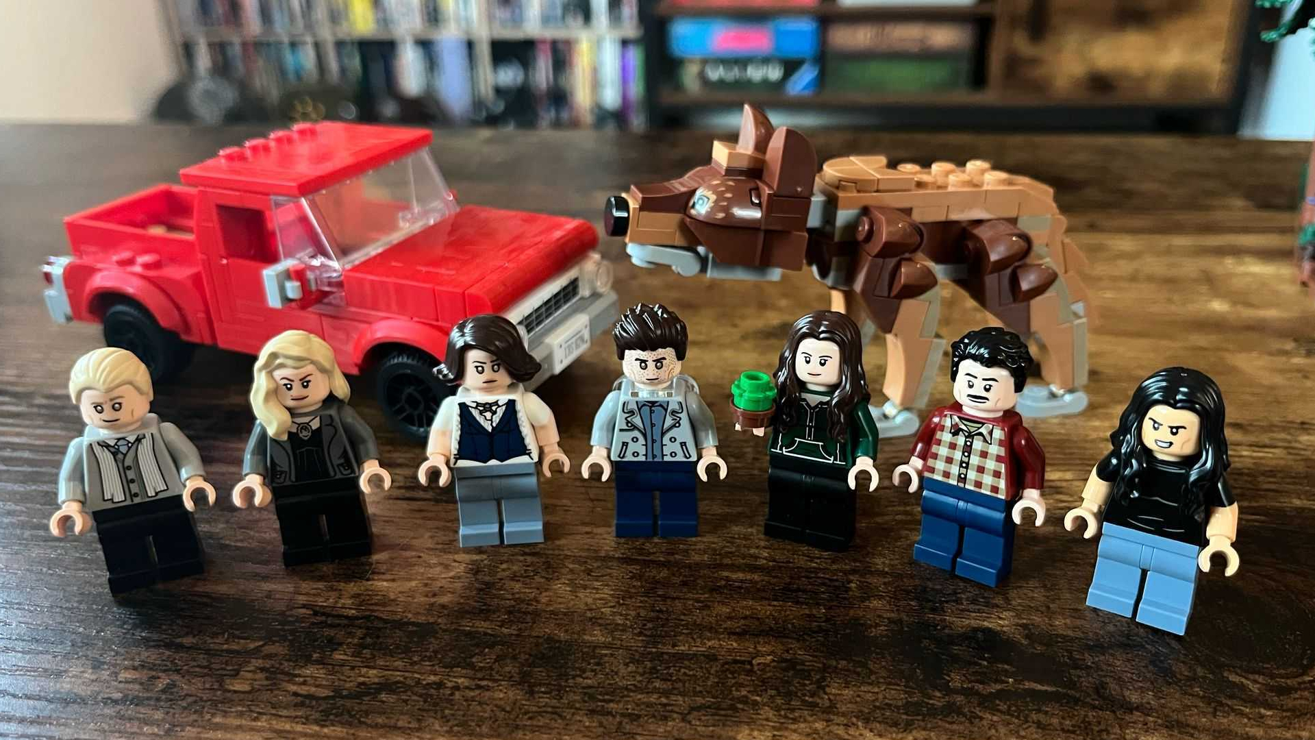 Lego The Twilight House minifigures, car, and wolf models on a plain background