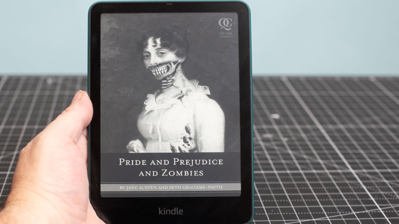 Kindle Paperwhite showing the cover of Pride and Prejudice and Zombies in black and white