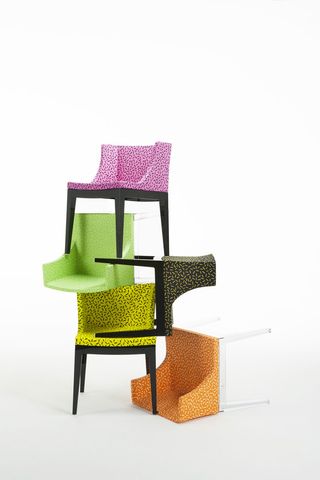Philippe Starck's 'Mademoiselle' chair, upholstered in Sottsass' Memphis 'Letraset' fabric