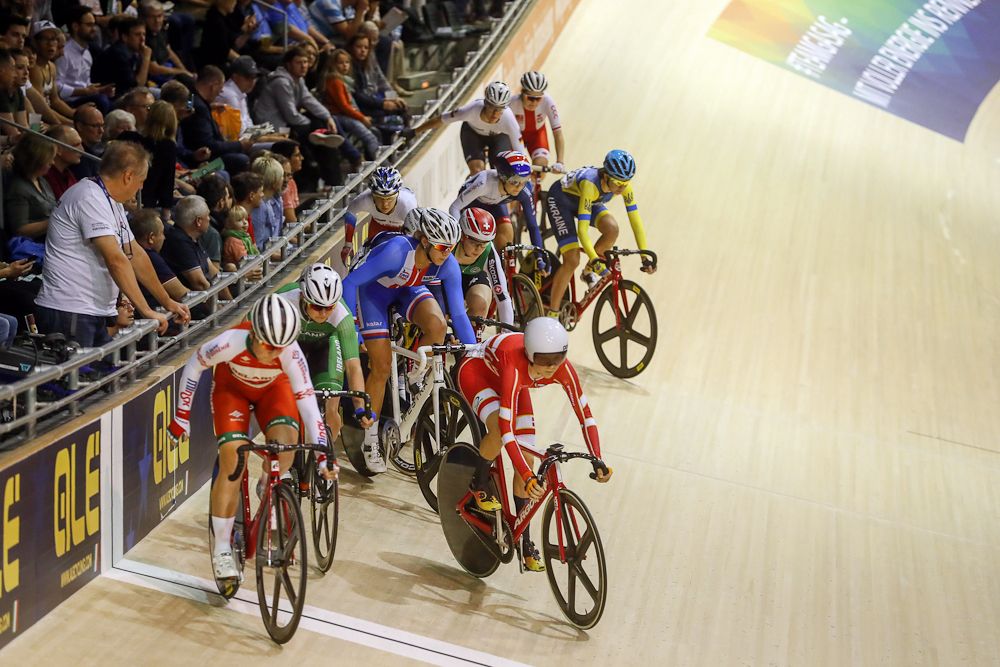 Riders drop off the barriers for the Madison