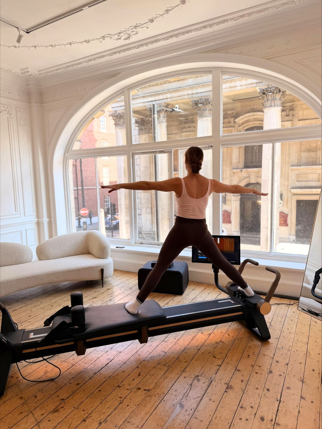 Health freelancer Anna Bartter trying NordicTrack Ultra 1 Reformer Pilates Machine