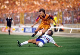 Barcelona's Michael Laudrup evades a challenge from Sampdoria's Moreno Mannini in the 1992 European Cup final.