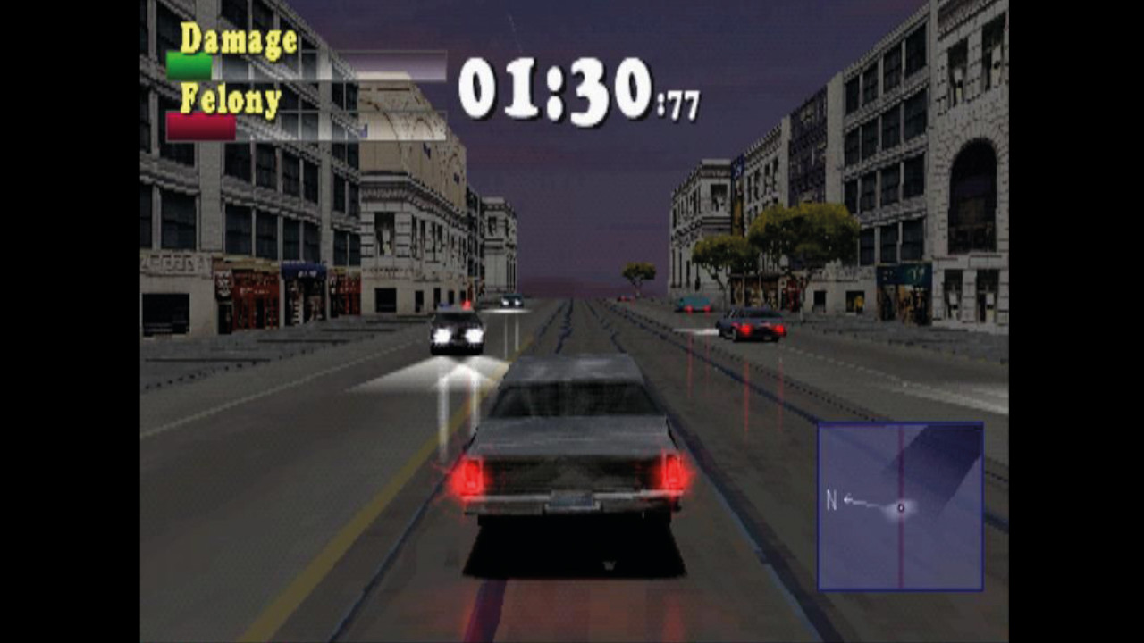 John Tanner barrels across tram tracks as a police cruiser drives our way with headlights on at night in Driver for PS1, from the PLAY Magazine retrospective