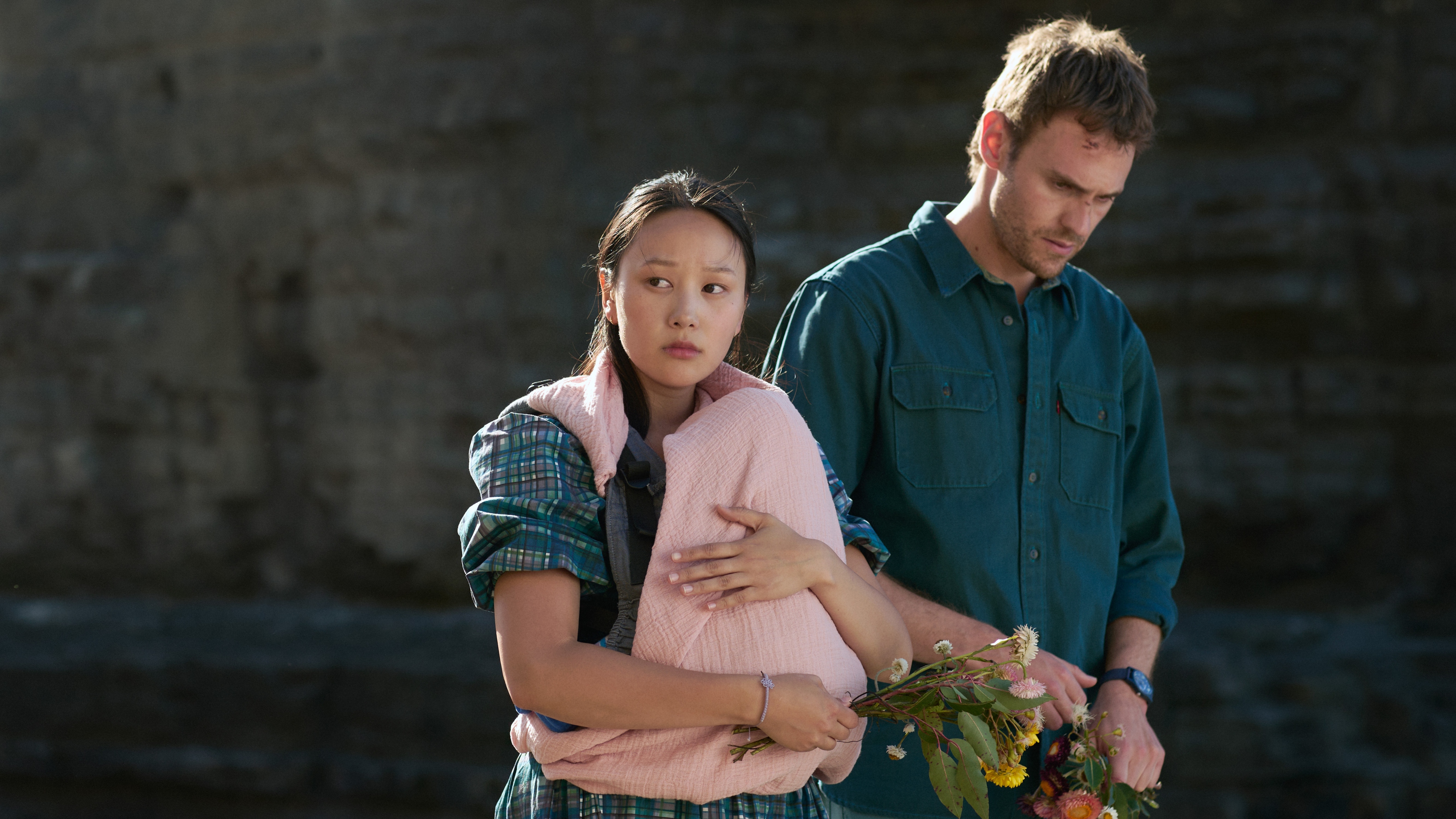 (L to R) Yerin Ha as Mia, Charlie Vickers as Kieran in The Survivors