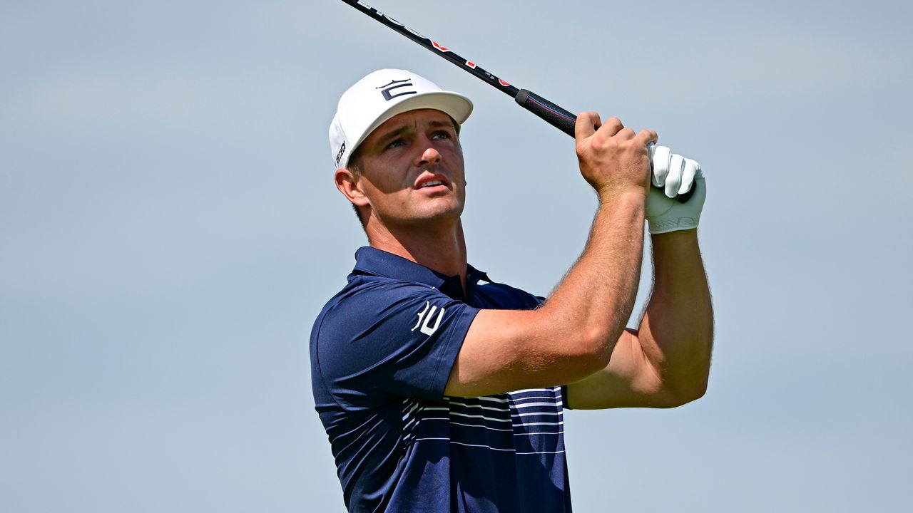 Bryson DeChambeau hits a golf shot