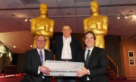 PricewaterhouseCoopers partners and Academy president Tom Sherak (center) attend the final Oscar ballot mailing on Feb. 1: A new study shows that 94 percent of Oscar voters are white.