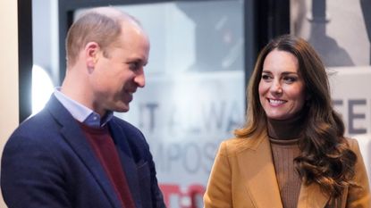 Britain's Prince William, Duke of Cambridge (L) and Britain's Catherine, Duchess of Cambridge, visit Church on the Street in Burnley, northern England on January 20, 2022, where they met with volunteers and staff to hear about their motivations for working with Church on the Street as well as a number of service users to hear about their experiences first-hand. - Church on the Street provides a food bank, a clothing bank, hot showers, laundry facilities, a cafe, recovery groups, addiction and mental health support, access to a qualified counsellor, and a safe space for up to two hundred people at any one time. 