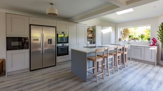 pale grey kitchen with long kitchen island