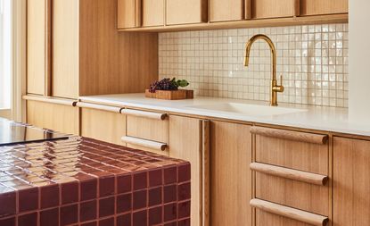 a kitchen with a tiled island