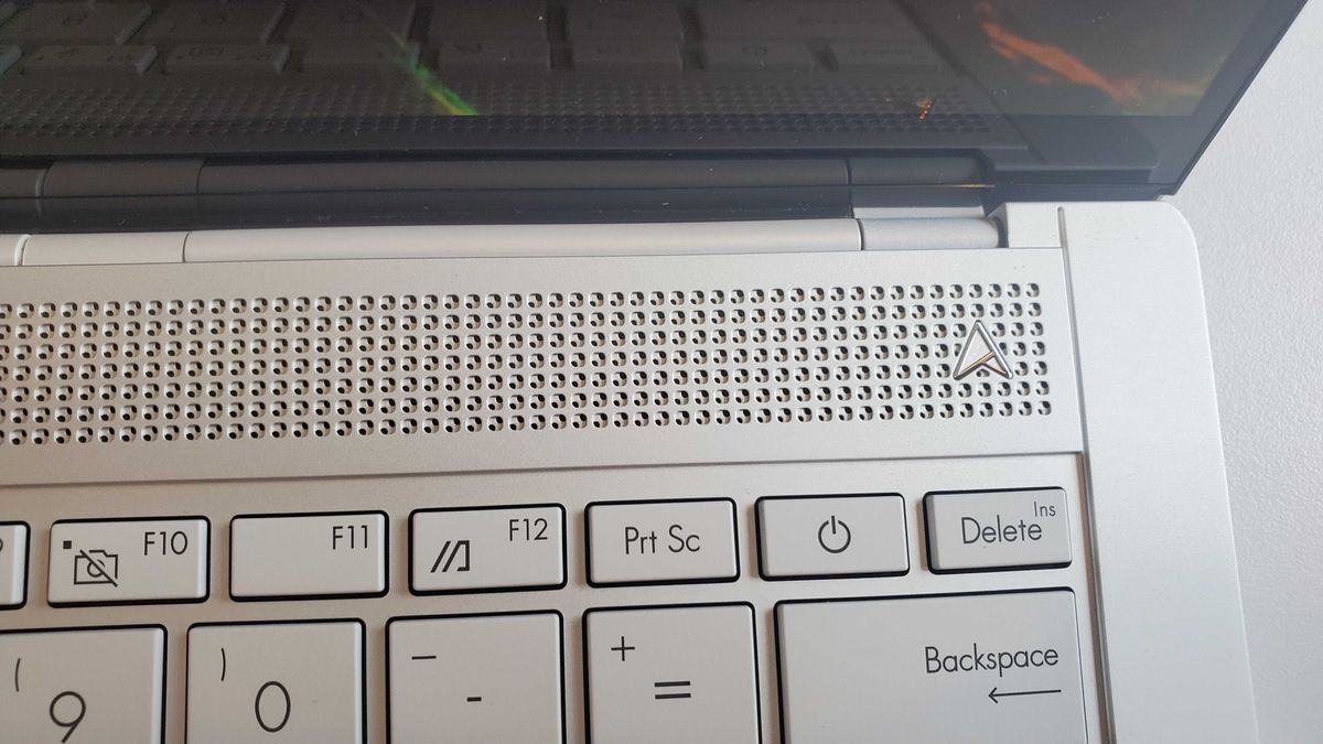 light silver laptop on table