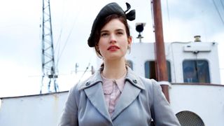 Lily James as Juliet Ashton in The Guernsey Literary and Potato Peel Pie Society