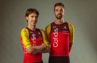 Two Cofidis riders in their new 2025 kit, with red body and yellow arms