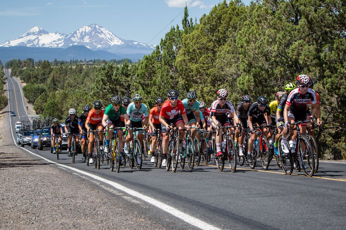 The women roll down the long backside straight