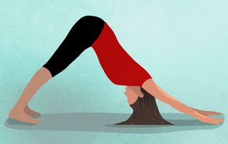 Woman in downward dog pose