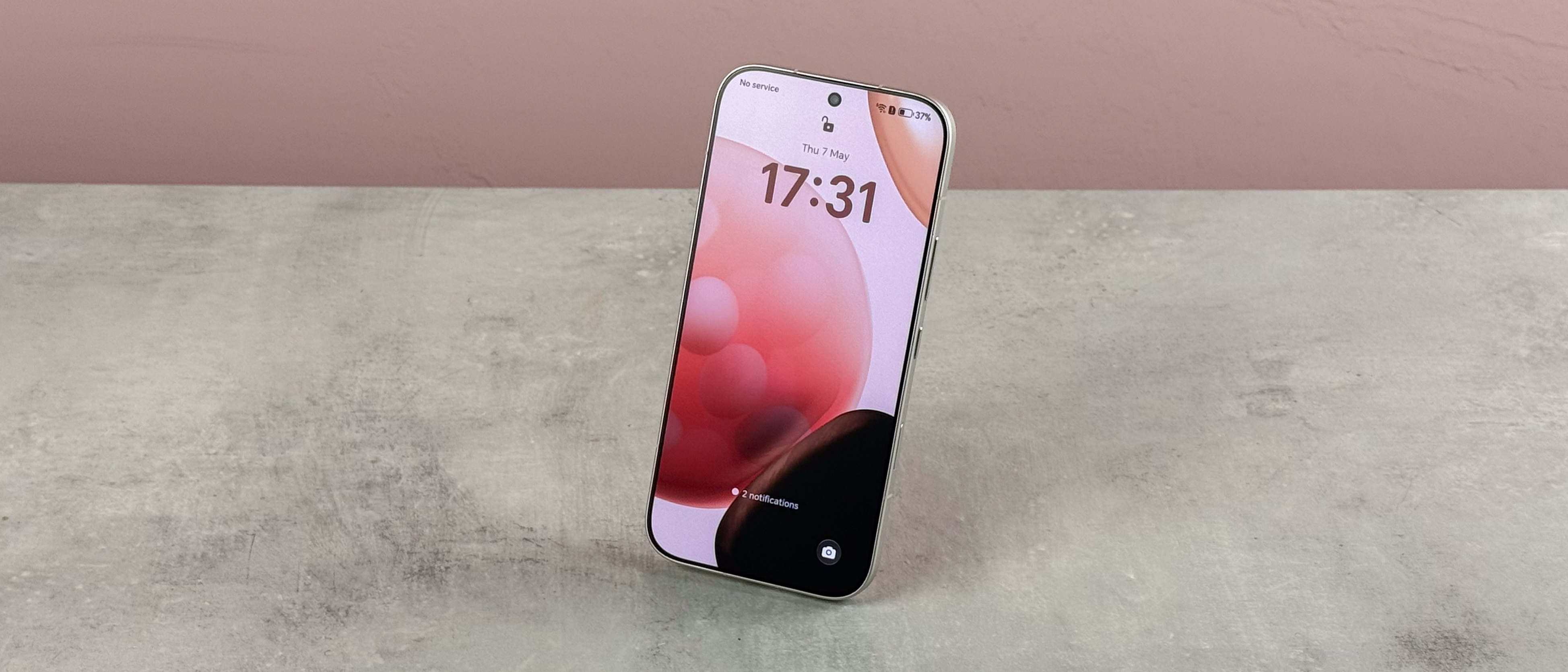 The Honor 600 at a slight angle showing the lock screen.