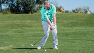 The position of the hands in the golf swing coming into impact