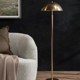 A tall gold lamp from McGee & Co.