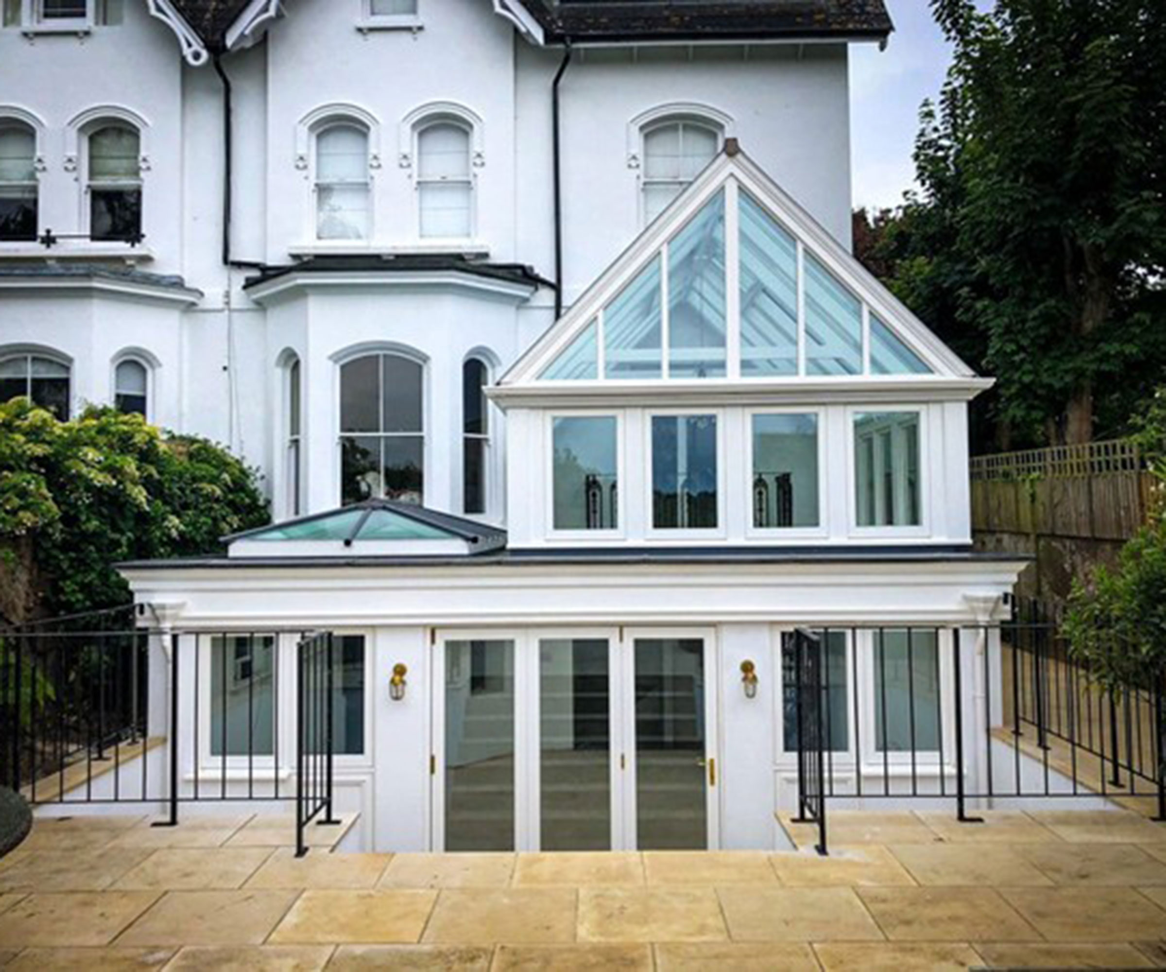 two-storey conservatory on rear of three storey townhouse