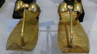 King Tut likely didn't wear these golden sandals when he was alive.