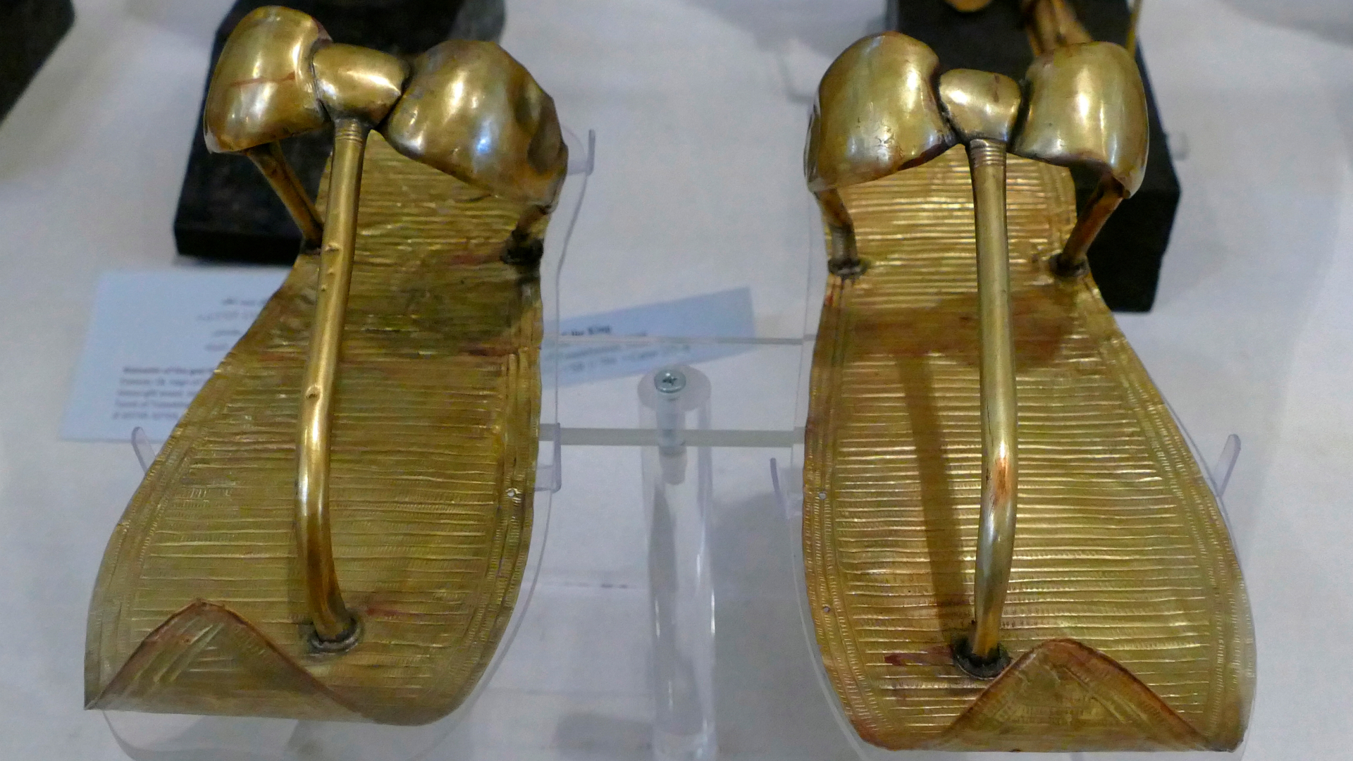 King Tutan most likely did not wear these golden sandals when he was alive.