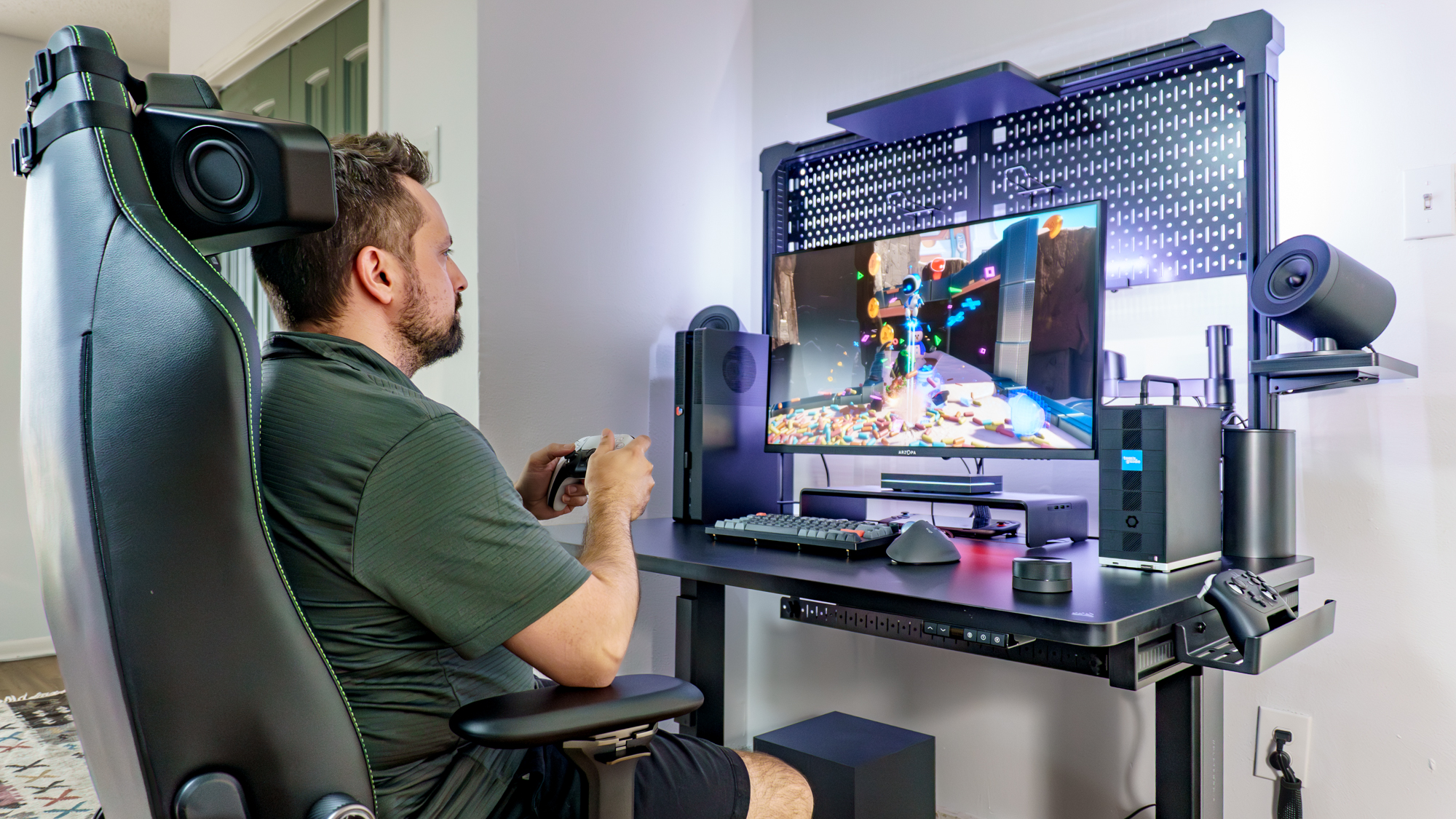 A person playing AstroBot on a PS5 Pro outfitted with BoxPlates console covers