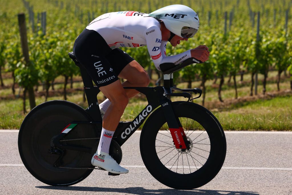 Team UAE's Danish rider Mikkel Bjerg competes in the 14th stage of the 107th Giro d'Italia cycling race, a time trial between Castiglione delle Stiviere and Desenzano del Garda, on May 18, 2024. (Photo by Luca Bettini / AFP)