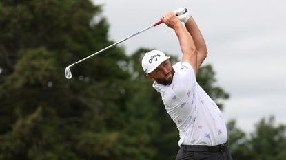 Jon Rahm plays his shot from the fifth tee during the Travelers Championship.