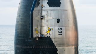 The upper stage of SpaceX's sixth Starship vehicle rolls out to the launch pad ahead of a planned Nov. 18, 2024 test flight. SpaceX released this photo via X on Nov. 12, 2024.