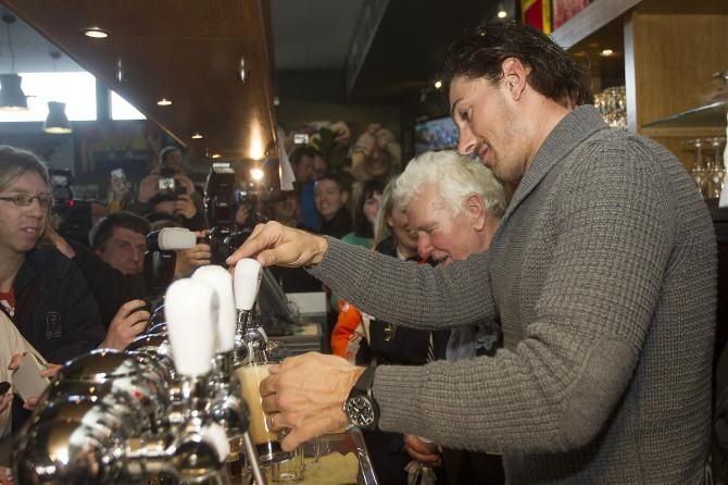 No loaves and fishes, but plenty of liquid refreshment for the masses at the Fabian Cancellara fan club in Oudenaarde.