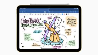 An Apple iPad running Goodnotes 6. There is an Apple Pencil magnetically attached to the top of the iPad.