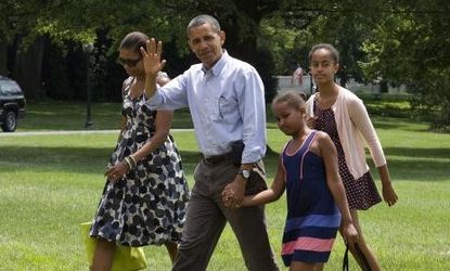 Obama and his family return from a weekend vacation in Bar Harbor, Maine.