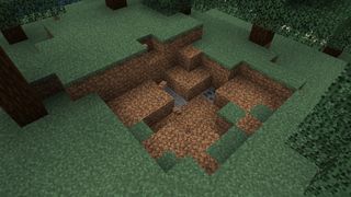 Minecraft creeper - a hole in the ground left by a creeper explosion