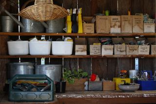 shed storage ideas: labelled boxes on shelves