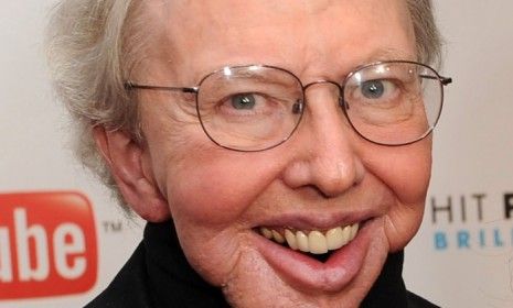 Roger Ebert, who lost part of his chin to cancer, will wear a silicone prosthetic over his neck and lower face for PBS&amp;#039;s new incarnation of &amp;quot;At the Movies.&amp;quot;