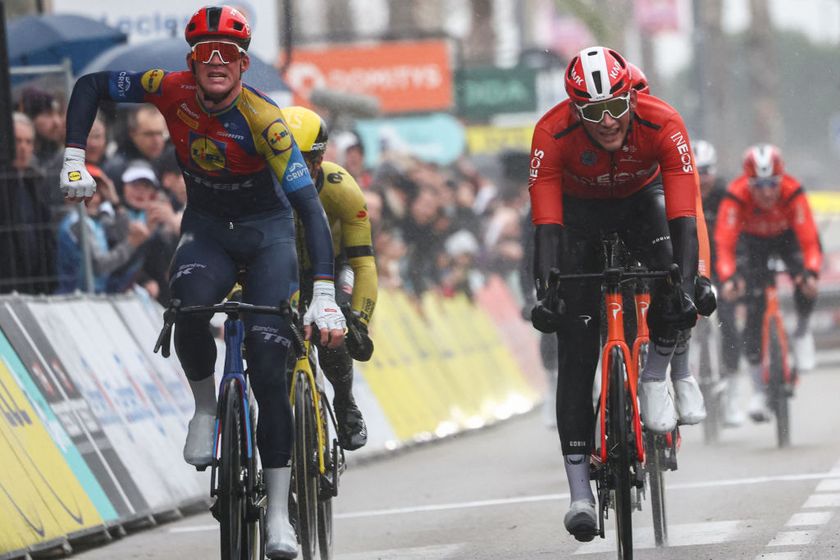 Lidl-Trek&#039;s Danish rider Mads Pedersen (L) celebrates next to Ineos Grenadiers&#039; British rider Joshua Tarling as he crosses the finish line to win the 6th stage of the Paris-Nice cycling race, 209,8 km between Saint-Julien-en-Saint-Alban and Berre lâ€™Ã‰tang, on March 14, 2025. (Photo by Anne-Christine POUJOULAT / AFP)