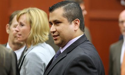 George Zimmerman exits the courtroom on July 13