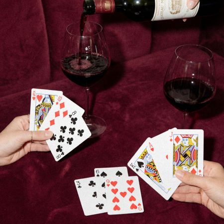 Analog Times - Wine and cards game night on luxurious burgundy fabric - TVS