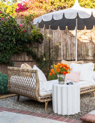daybed and parasol in backyard by Marie Flanigan